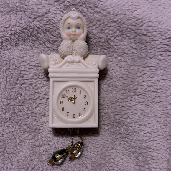 Dept 56… Snow Babies… Baby Sitting on a Clock Ornament… No Box - Picture 1 of 4